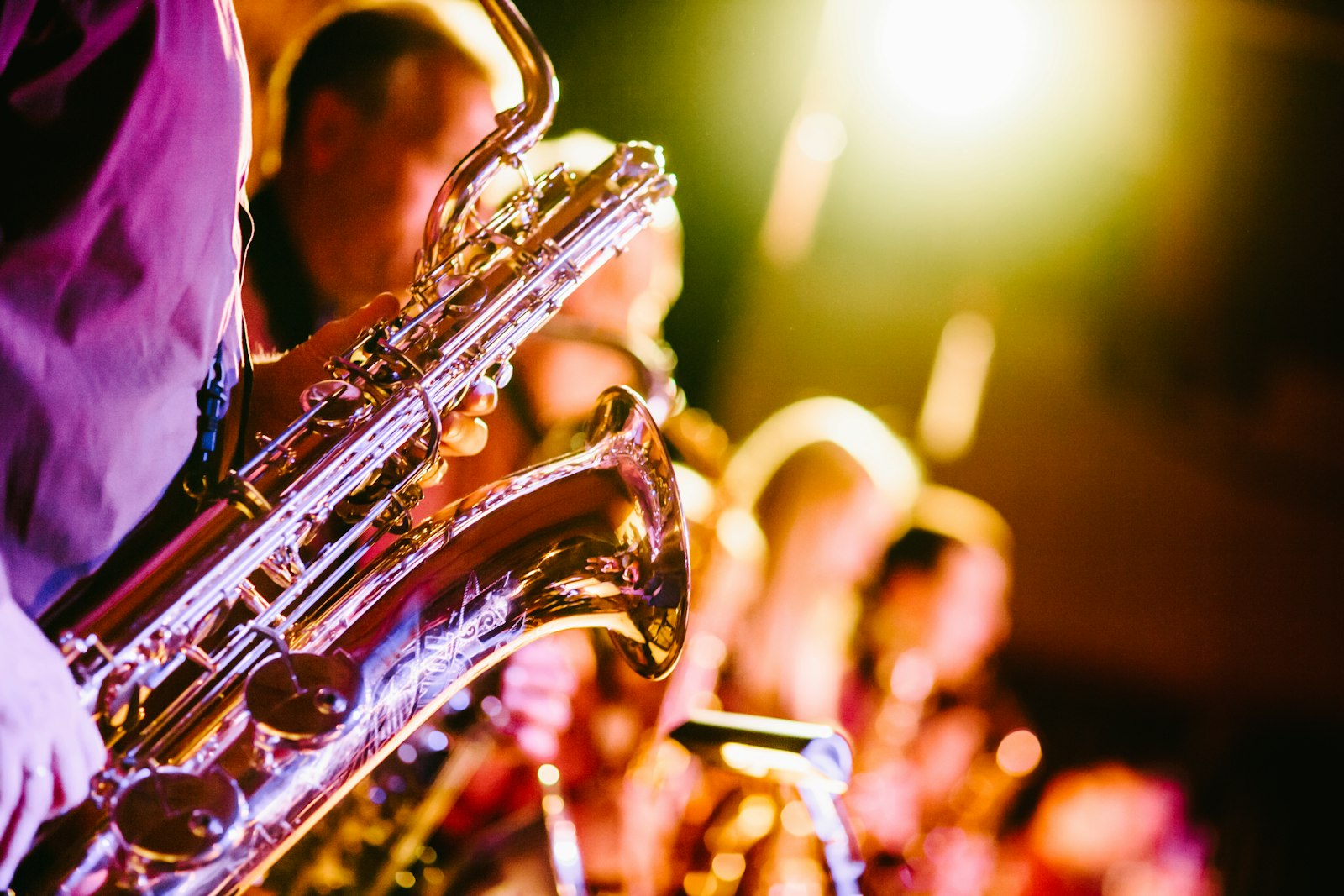 Saxophone player in warm stage light