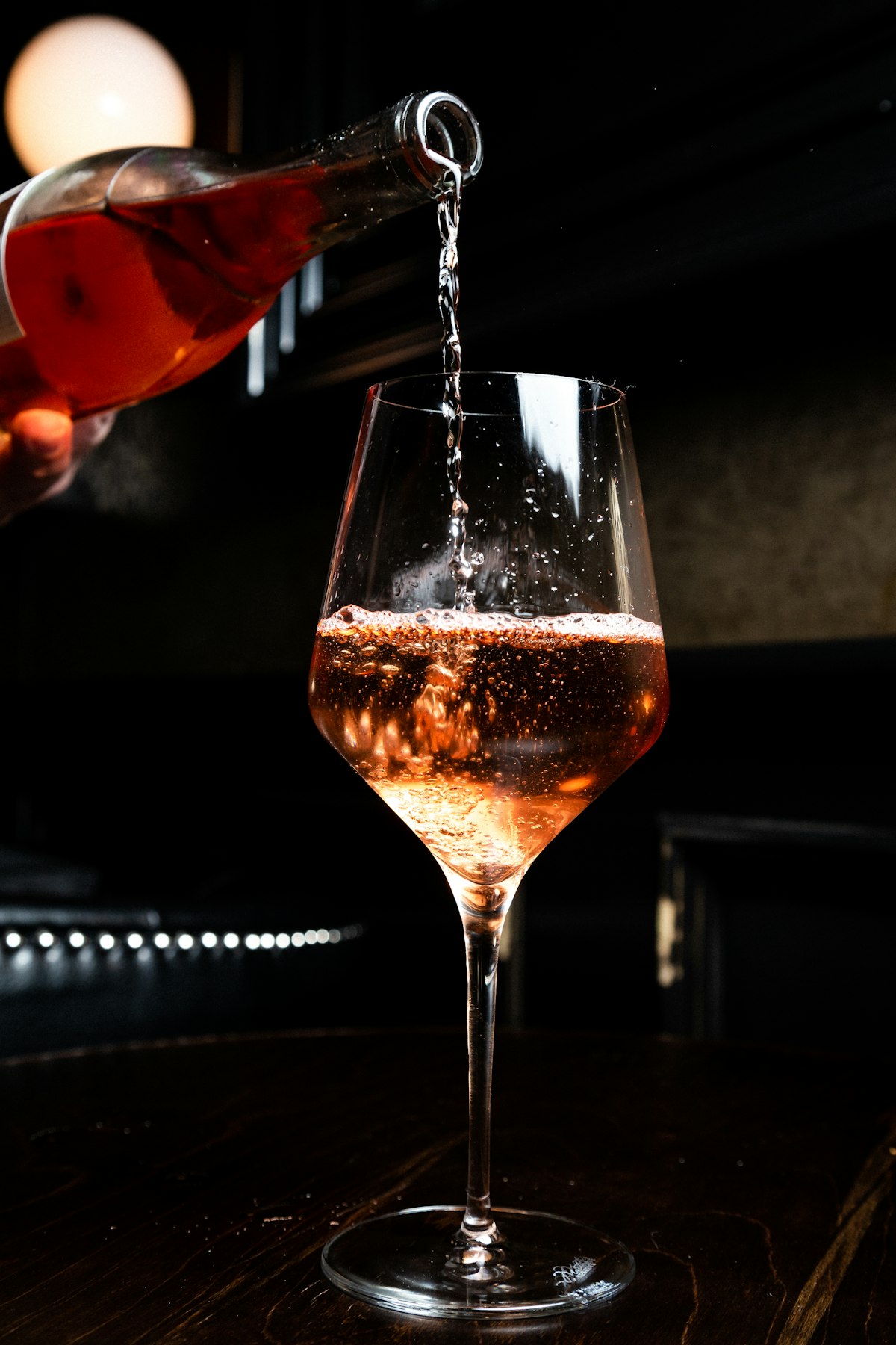 Sparkling rosé poured into a glass